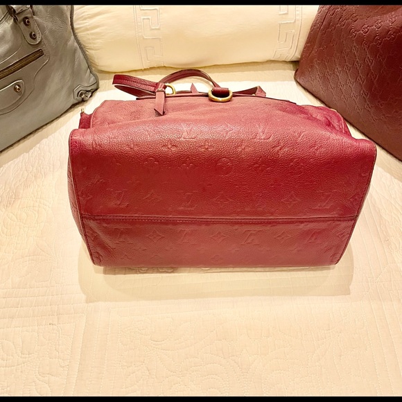 Authentic Loius Vuitton Lumineuse  Empriente Leather in Aurore color. - Picture 15 of 16